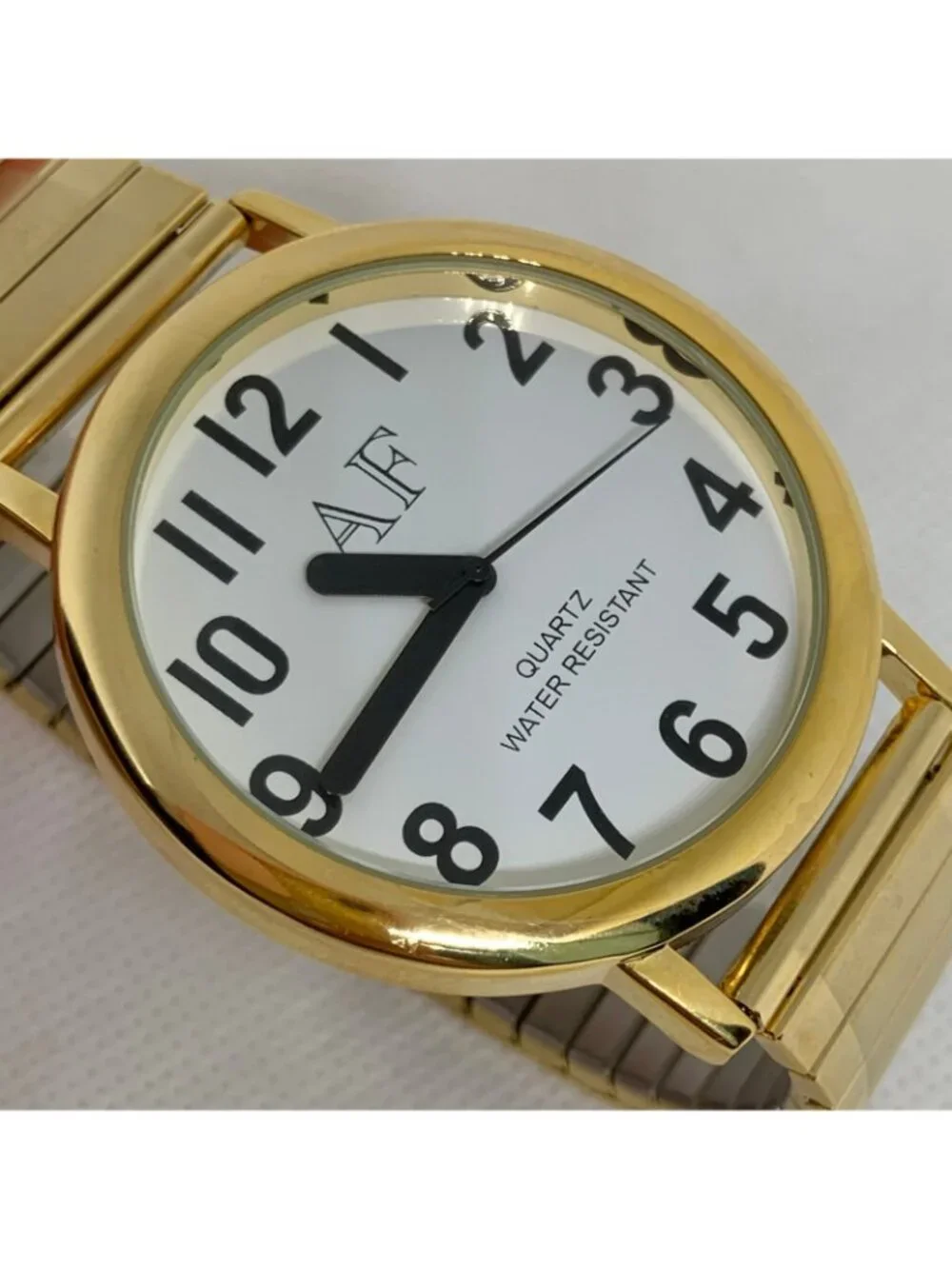A&F gold tone Quartz analog watch 42mm white dial easy reader numbers running